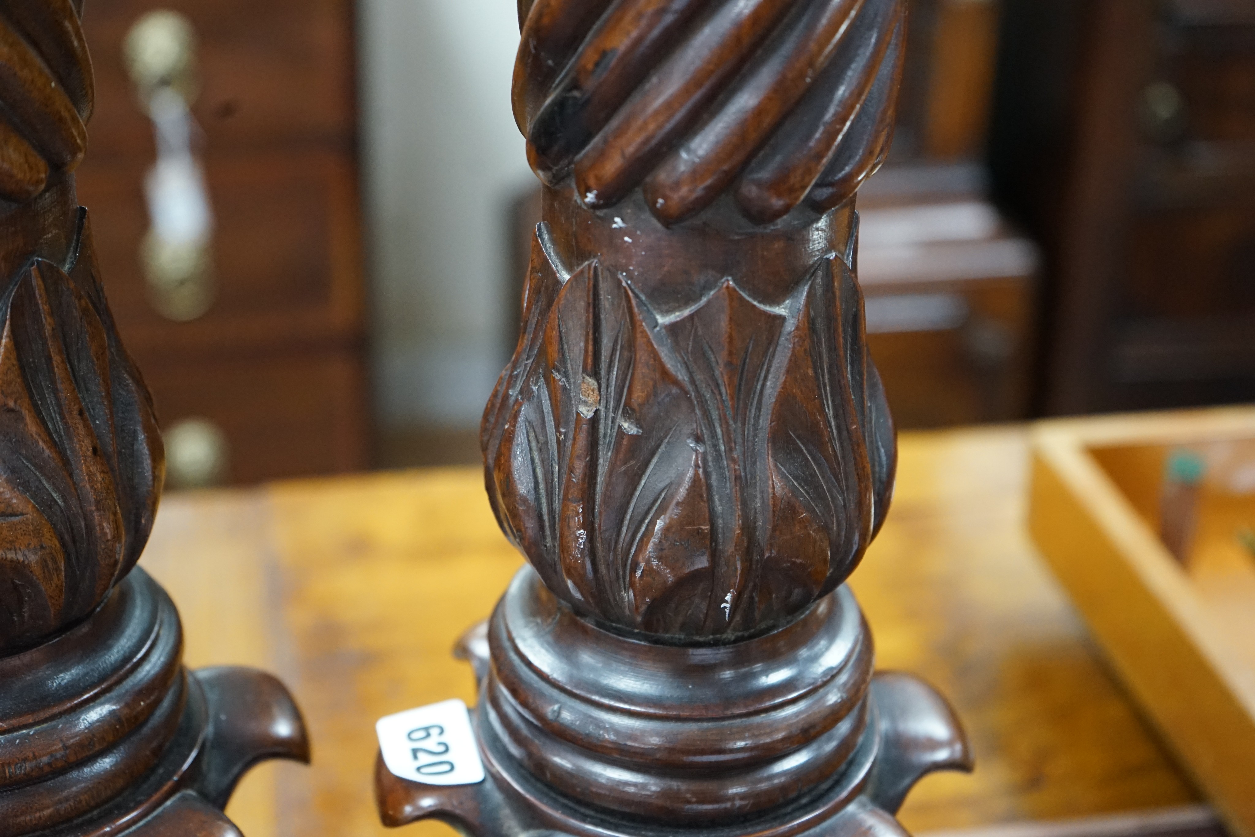A pair of William mahogany 'bedpost' candlestands